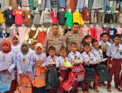 KBO Satlantas Polres Aceh Utara Belanja Seragam Sekolah untuk Anak Yatim