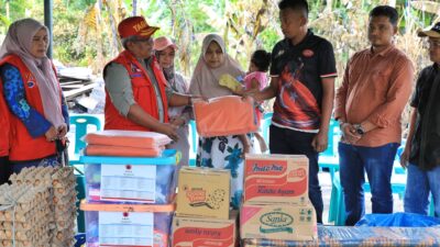 Pj Bupati Aceh Utara  Antar Bantuan untuk Korban Kebakaran di Cot Girek