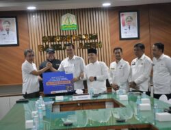 Terima Bantuan TMT, Sekda Aceh Tekankan Kolaborasi Percepat Pemulihan